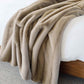 Mila faux fur blanket on side of bed, Vintage Mink