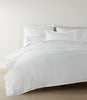 European Washed Linen Shams on bed with duvet, White