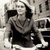 Founder Mary Ella Gabler on bicycle, Learn About Peacock Alley