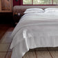 Soprano duvet cover on all white bed, White