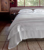 Soprano duvet cover on all white bed, White