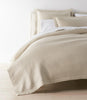 Angie Stonewashed Matelasse Coverlet Dune on bed