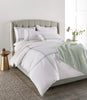 Duo Duvet and Shams Sage on Bed