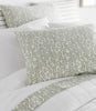 Fern Percale Sleeping Shams  Olive on Bed