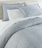 Ravenna Jacquard Shams on bed Blue