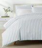 ribbon stripe percale Denim duvet cover on a bed